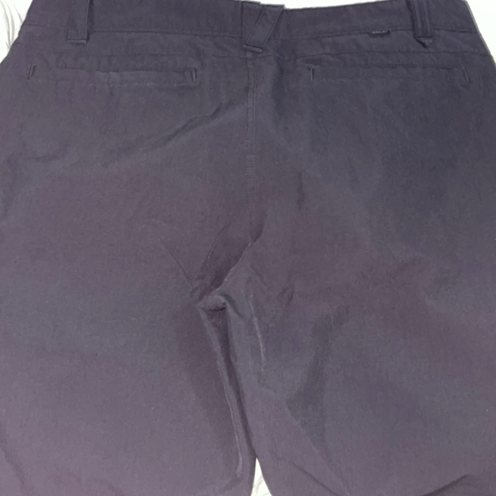 Men’s 2 pair Oakley shorts. Black and navy.  Size 38.  Used.